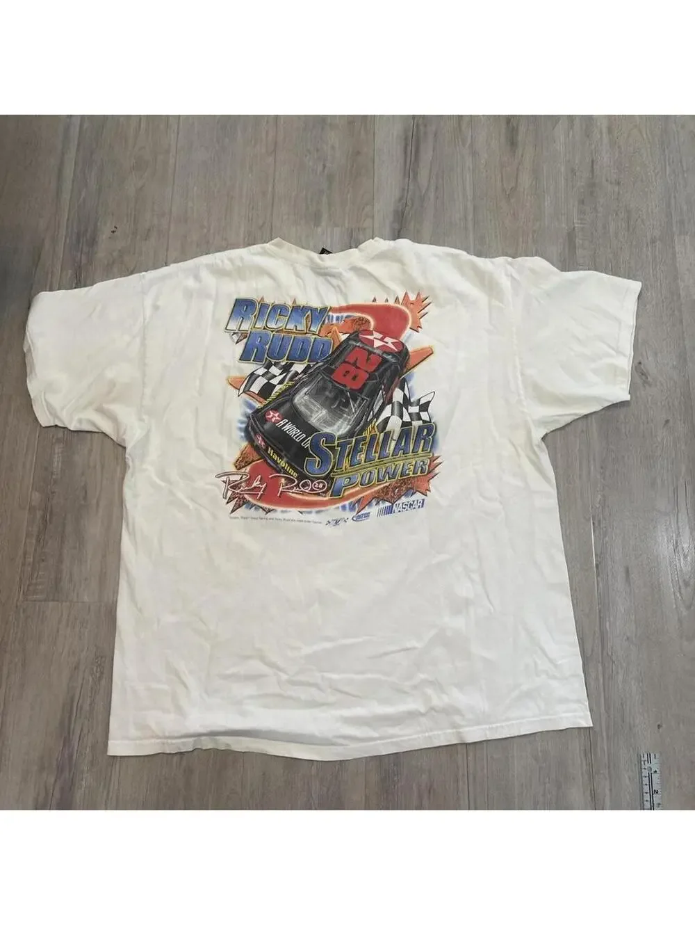 NASCAR 2000s NASCAR Star Pilot Tee with graphic of a red and black race car